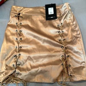 gold mini skirt brand new!
